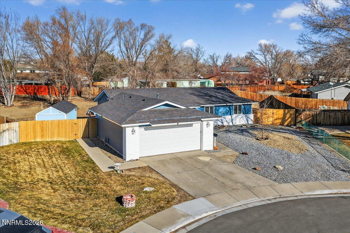1777 Howard Court Sparks, NV 89434 - Photo 2 of 32 a view of a house with a snow