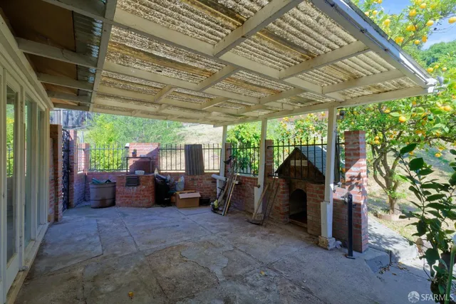 a view of yard with patio