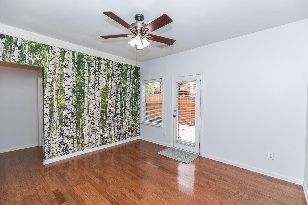 827 Charles Bank Avenue Southeast, Unit 827 Atlanta, GA 30312 - Photo 37 of 45 wooden floor in an empty room with a window