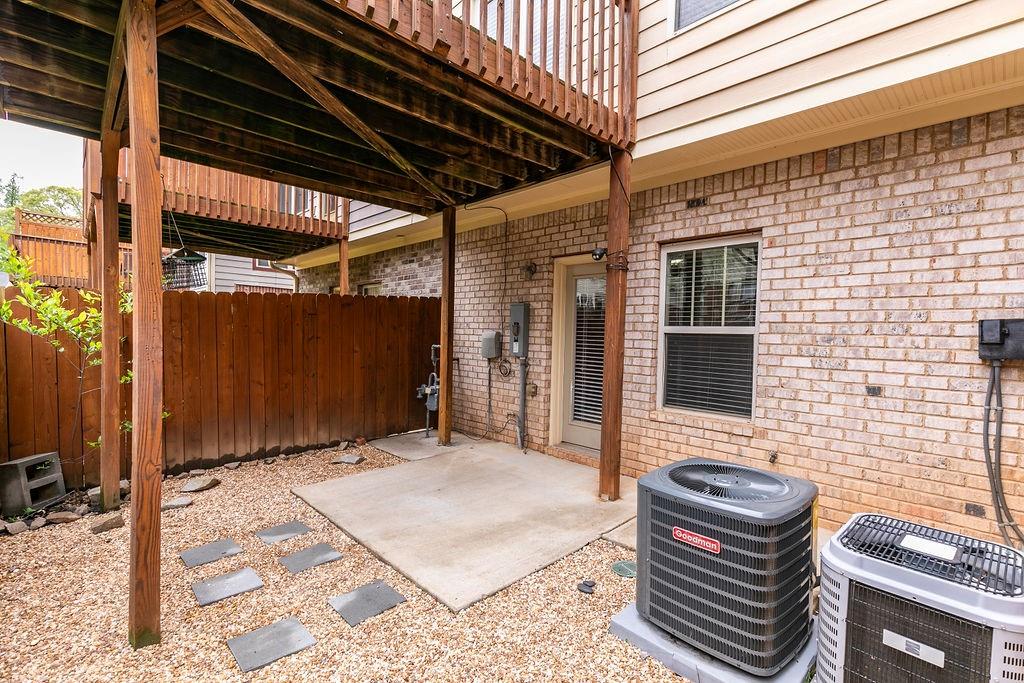 827 Charles Bank Avenue Southeast, Unit 827 Atlanta, GA 30312 - Photo 42 of 45 a backyard of a house with barbeque oven table and chairs