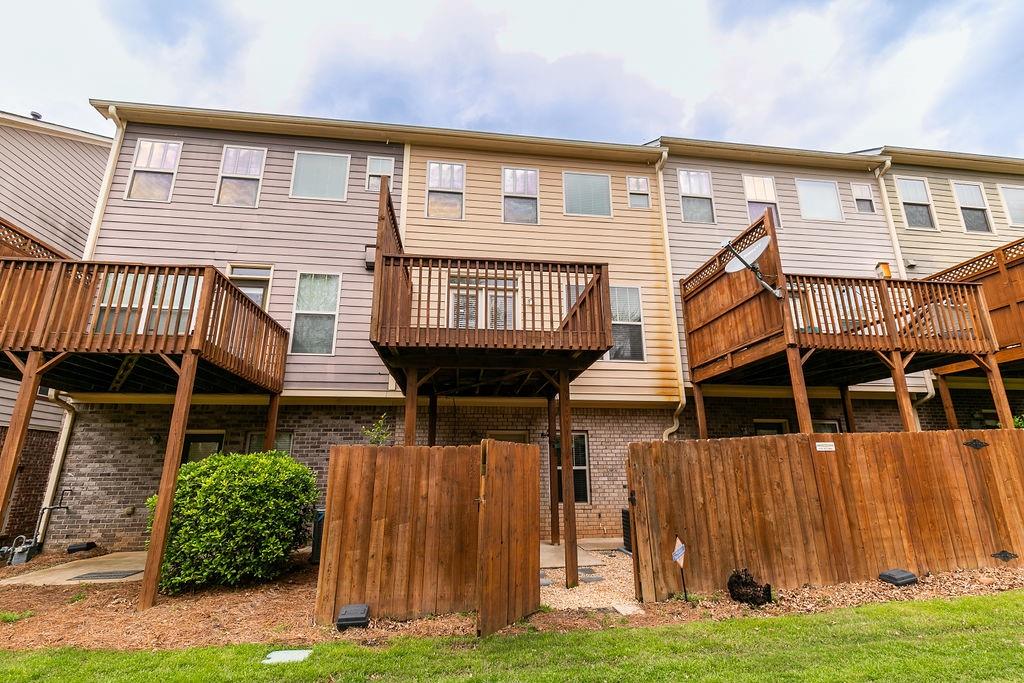 827 Charles Bank Avenue Southeast, Unit 827 Atlanta, GA 30312 - Photo 43 of 45 a front view of a house with a garden and plants