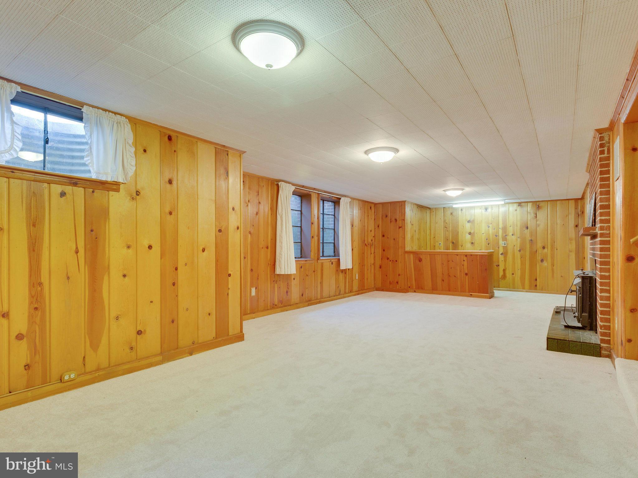 6714 Greenleaf Street Springfield, VA 22150 - Photo 22 of 30 a view of an empty room with wooden floor