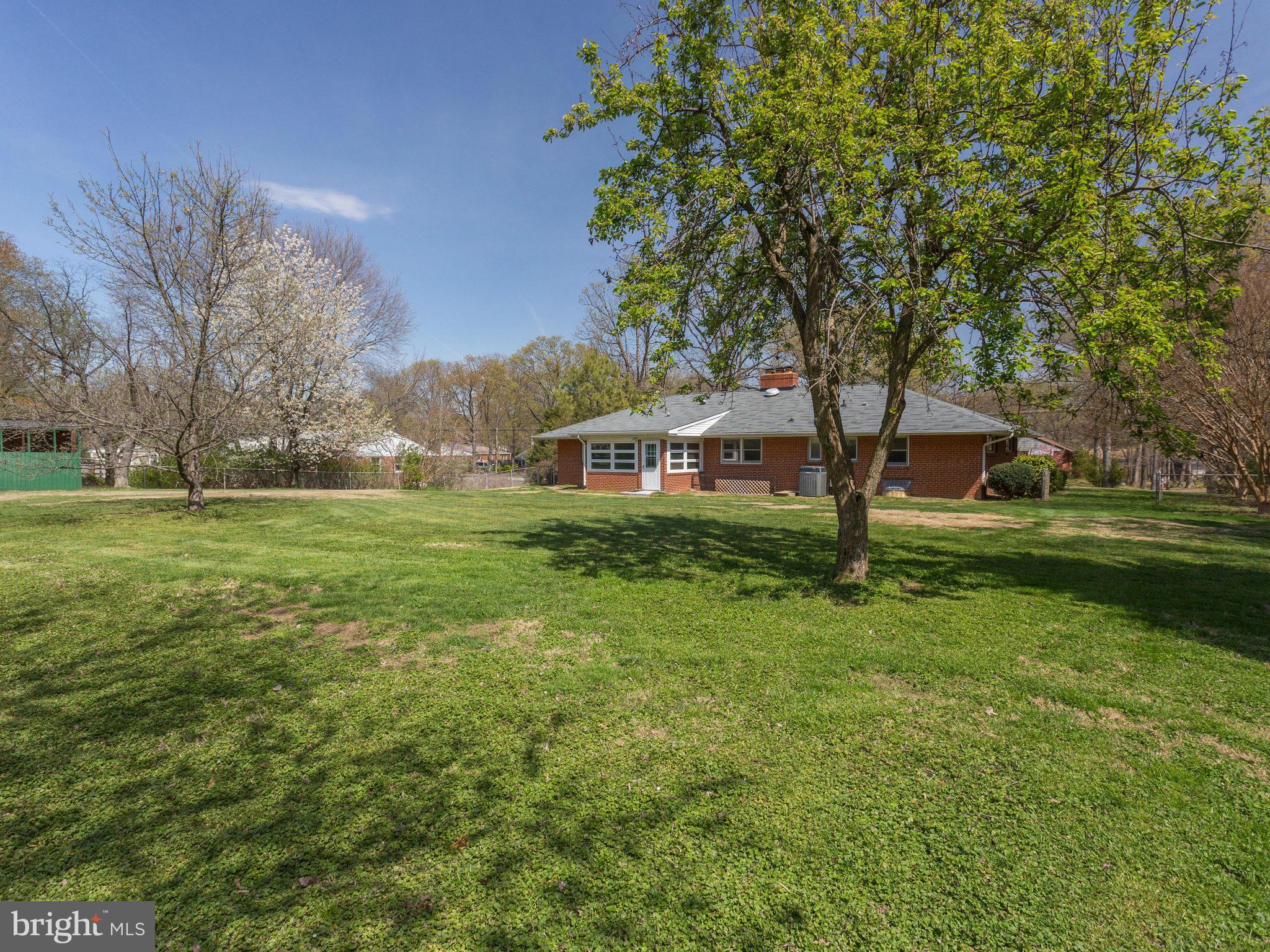 6714 Greenleaf Street Springfield, VA 22150 - Photo 30 of 30 a view of a house with a big yard