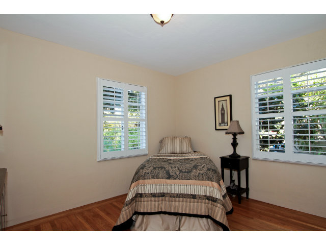 342 Willow Road Menlo Park, CA 94025 - Photo 11 of 15 a bedroom with a bed window and a night stand