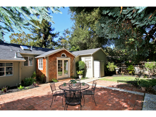 342 Willow Road Menlo Park, CA 94025 - Photo 14 of 15 a backyard of a house with table and chairs