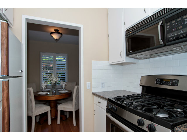 342 Willow Road Menlo Park, CA 94025 - Photo 5 of 15 a kitchen with a stove and a microwave
