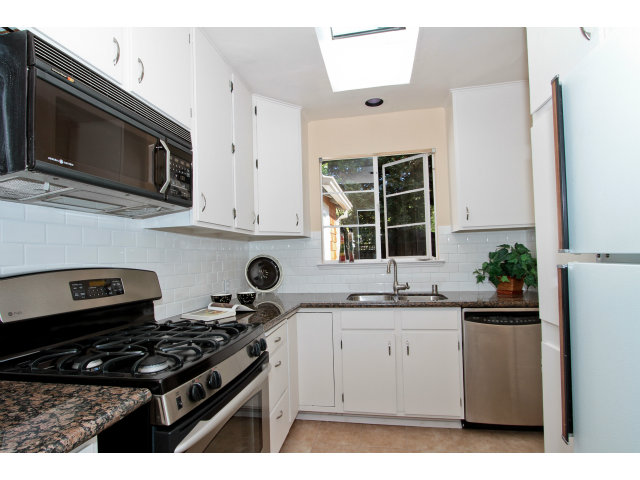342 Willow Road Menlo Park, CA 94025 - Photo 6 of 15 a kitchen with stainless steel appliances a sink stove and microwave