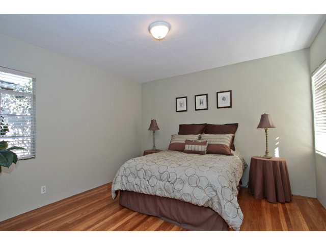 342 Willow Road Menlo Park, CA 94025 - Photo 9 of 15 a bedroom with a bed and a night stand
