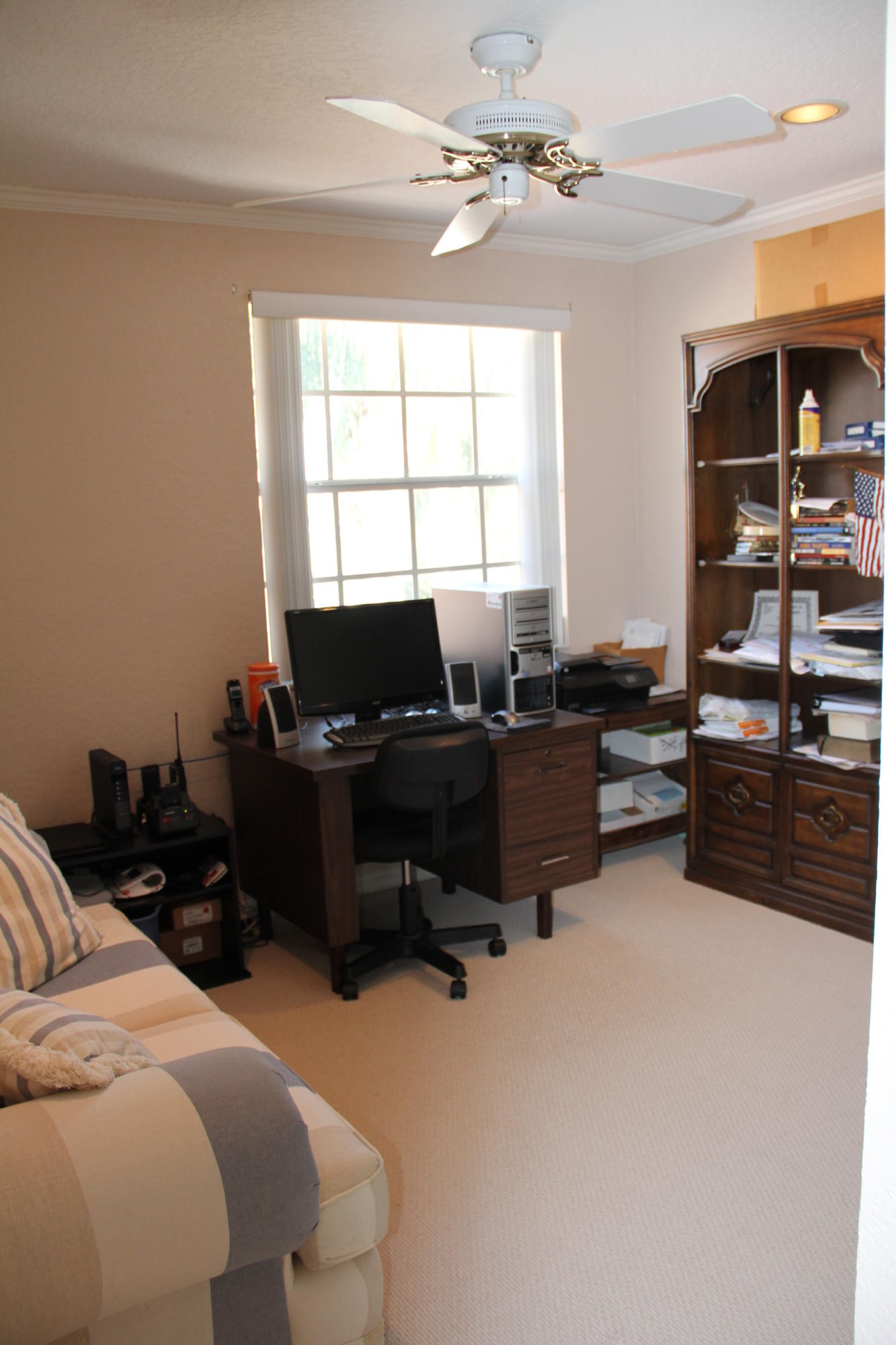 7354 Michigan Isle Road Lake Worth, FL 33467 - Photo 13 of 21 a bedroom with furniture and a window