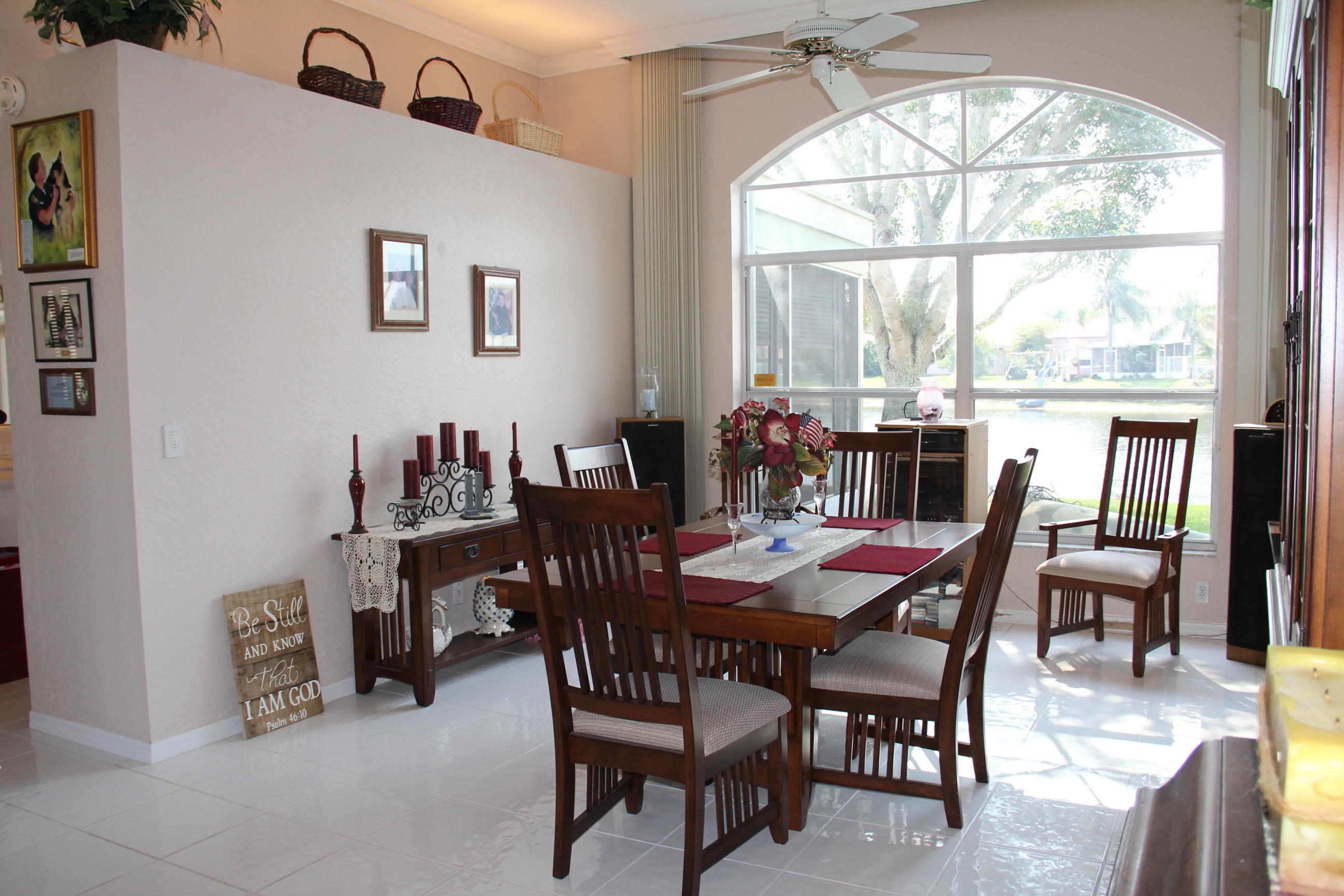 7354 Michigan Isle Road Lake Worth, FL 33467 - Photo 4 of 21 a view of a dining room with furniture window and outside view