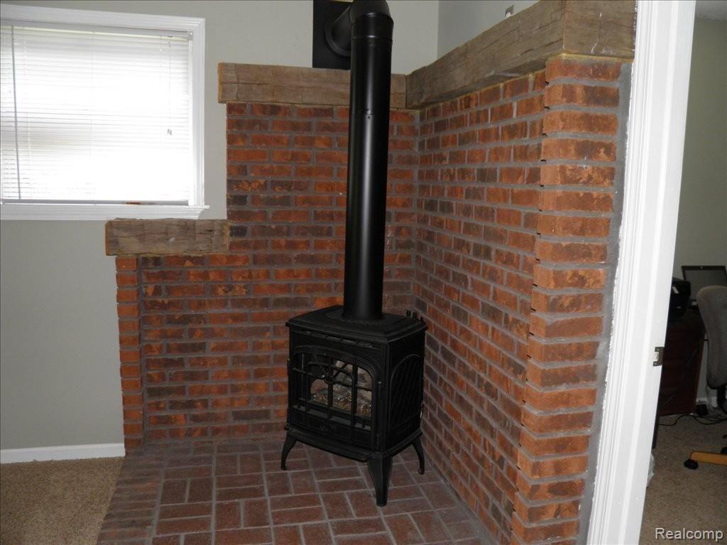 4941 Eagle Road Highland, MI 48356 - Photo 10 of 25 Master bedroom gas burner
