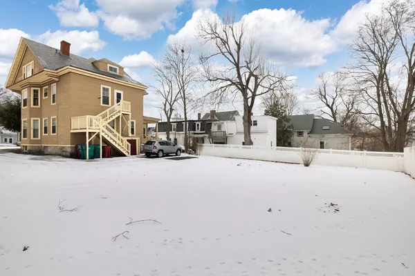 a view of road with a house
