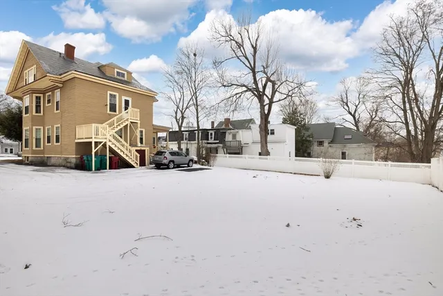 a view of road with a house