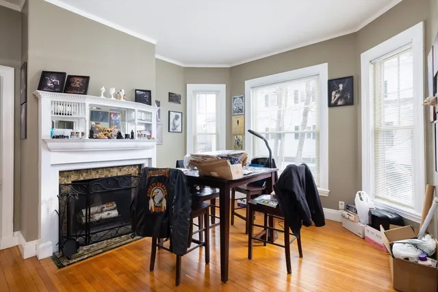 a view of a livingroom with furniture and a fireplace