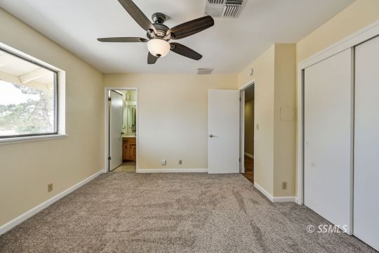 418 North Inyo Street Ridgecrest, CA 93555 - Photo 18 of 35 a view of an empty room with a window