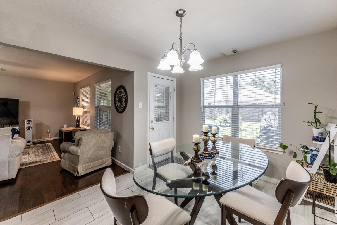 13507 Beech Ridge Lane Houston, TX 77083 - Photo 18 of 49 a view of a dining room with furniture window and outside view