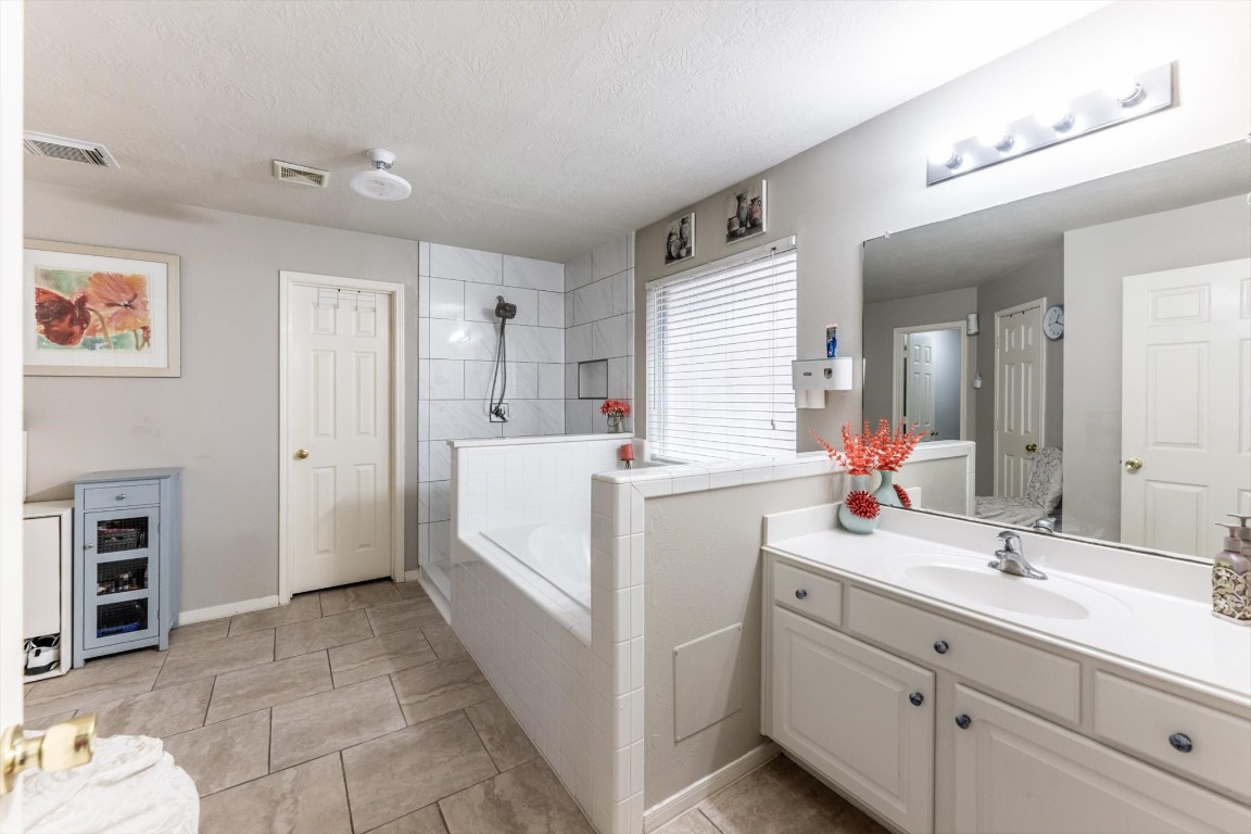 13507 Beech Ridge Lane Houston, TX 77083 - Photo 26 of 49 a view of a kitchen with cabinets
