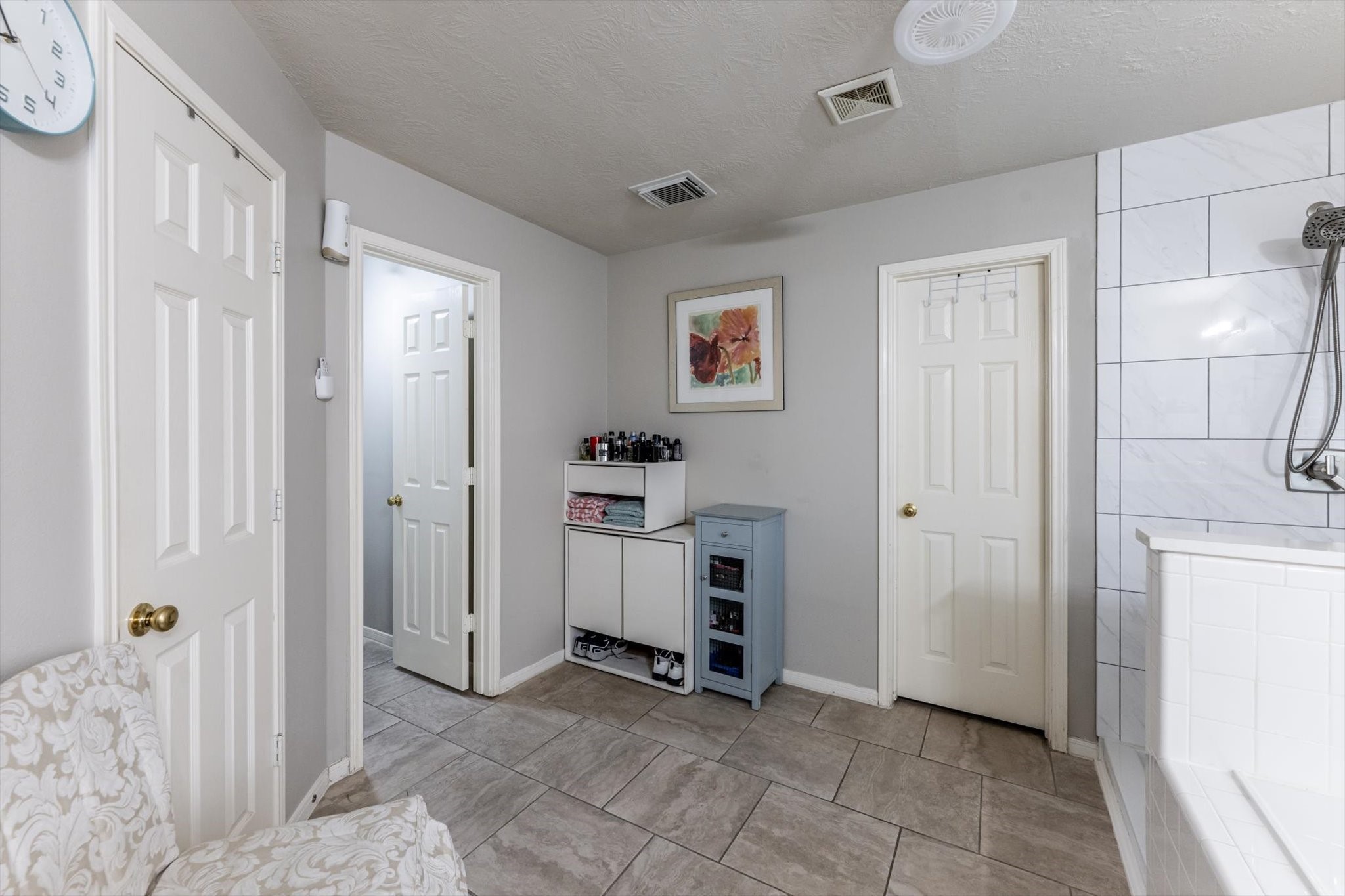 13507 Beech Ridge Lane Houston, TX 77083 - Photo 27 of 49 a view of a storage & utility room with closet dryer