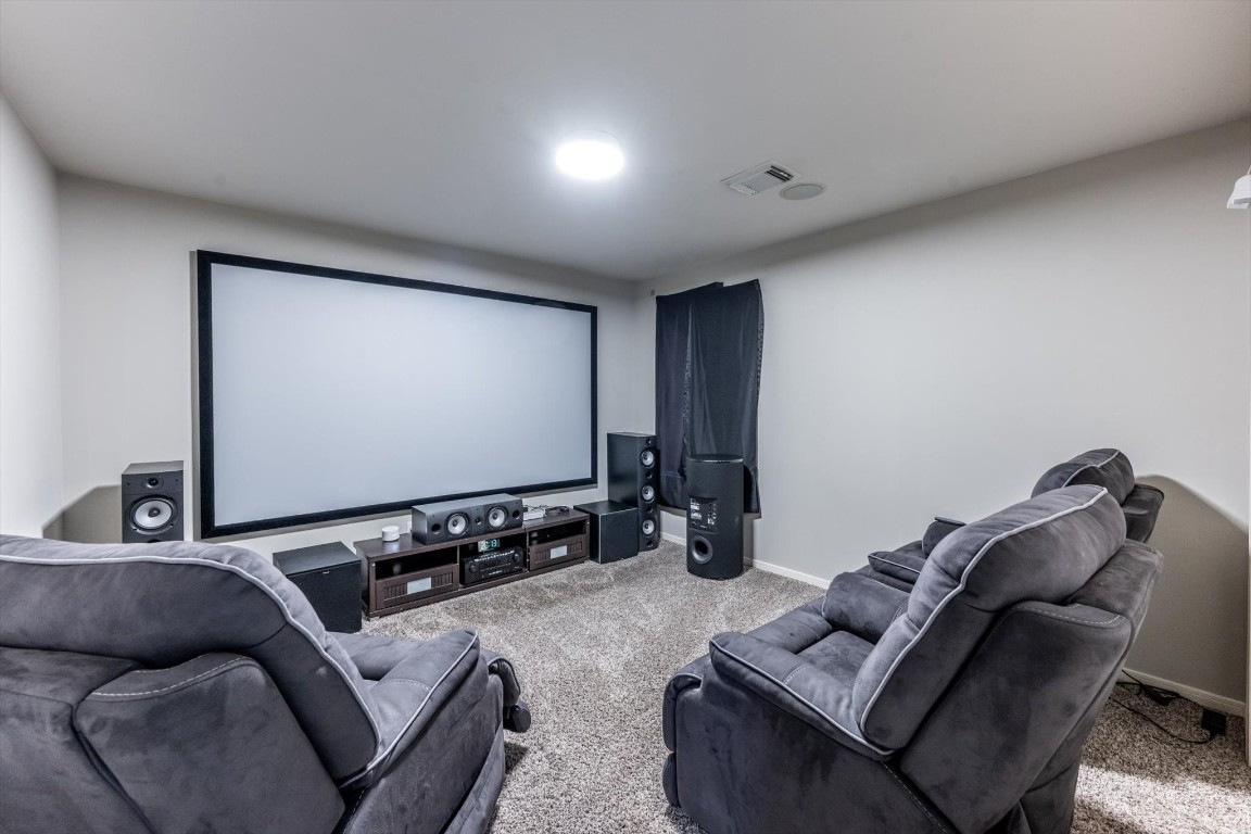 13507 Beech Ridge Lane Houston, TX 77083 - Photo 33 of 49 a projector room with furniture