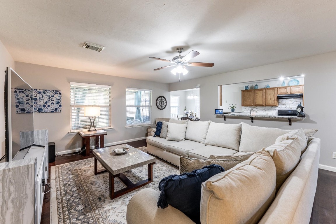 13507 Beech Ridge Lane Houston, TX 77083 - Photo 9 of 49 a living room with furniture kitchen view and a window