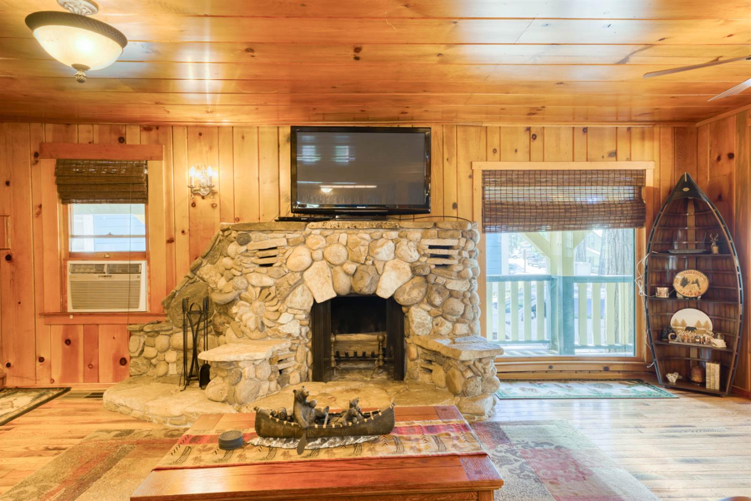 42025 Tollhouse Road Shaver Lake, CA 93664 - Photo 4 of 64 a living room with fireplace