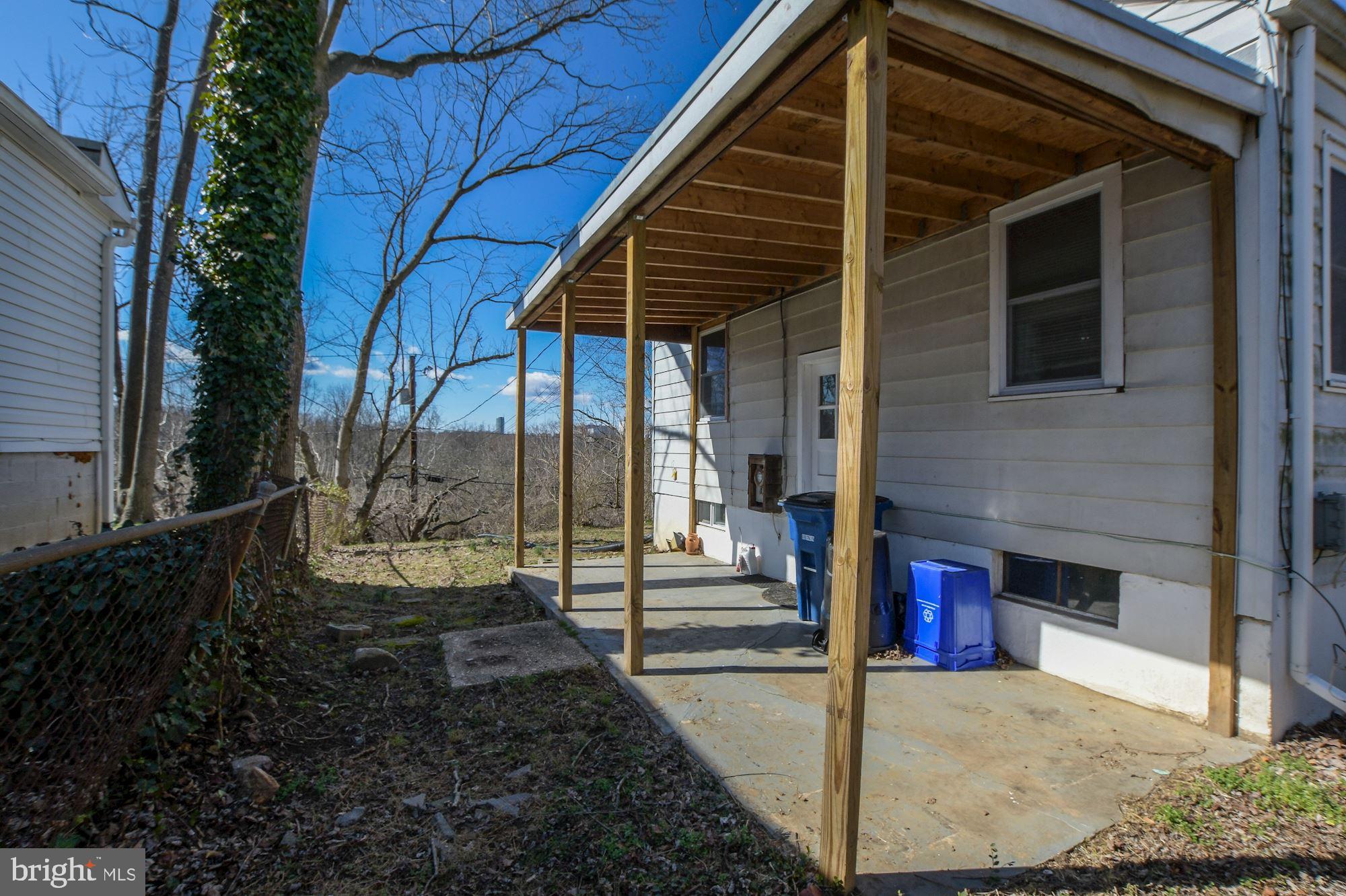 11611 Dewey Road Silver Spring, MD 20906 - Photo 14 of 45 Exterior Side Porch