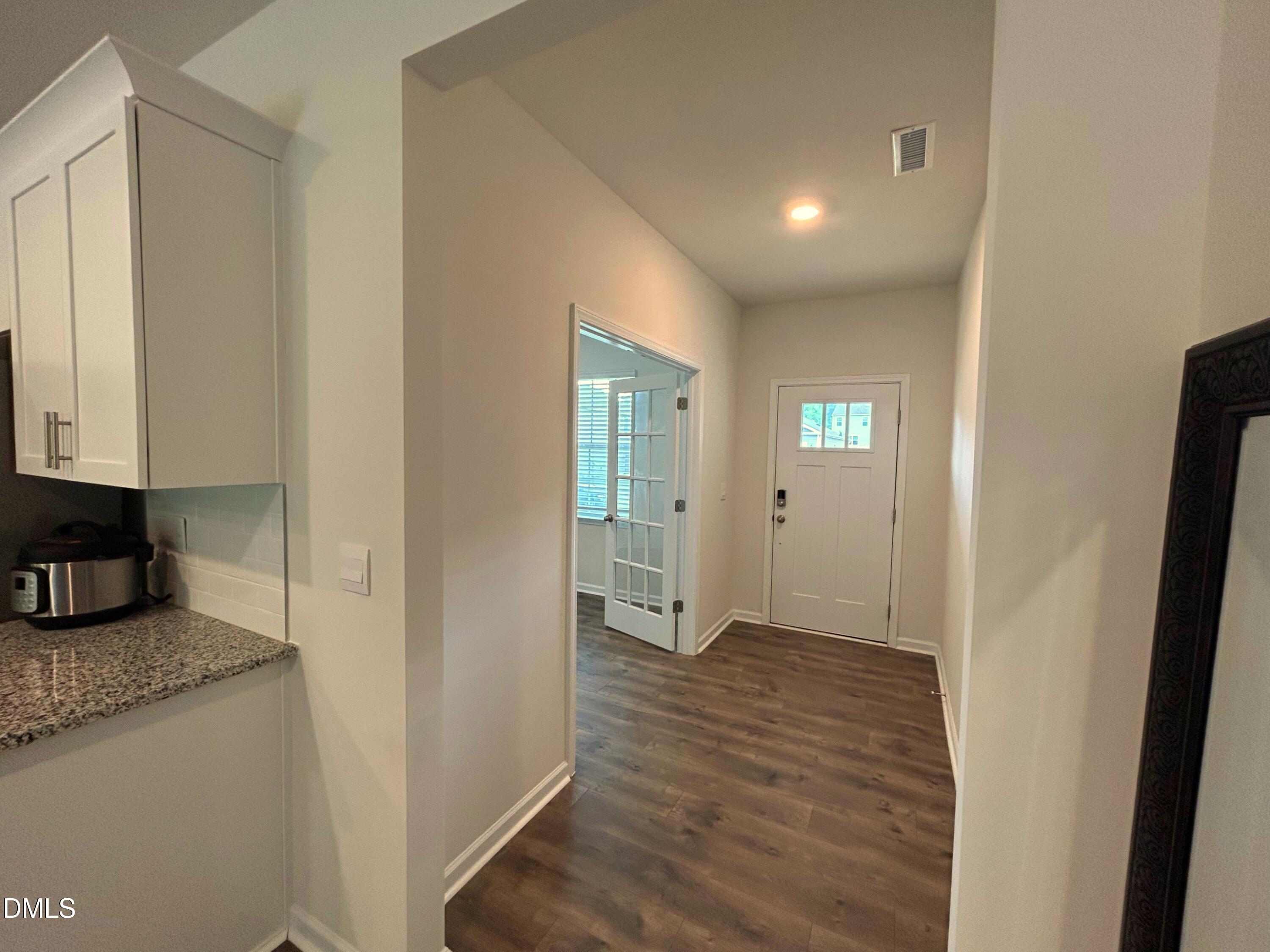 2264 Fletchers Ridge Drive Durham, NC 27703 - Photo 5 of 41 7. French doors leading to the front fle