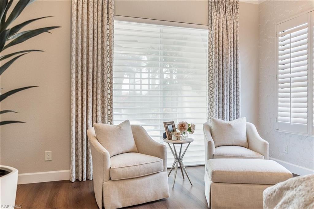 12130 Wicklow Lane Naples, FL 34120 - Photo 20 of 45 a living room with furniture and a large window