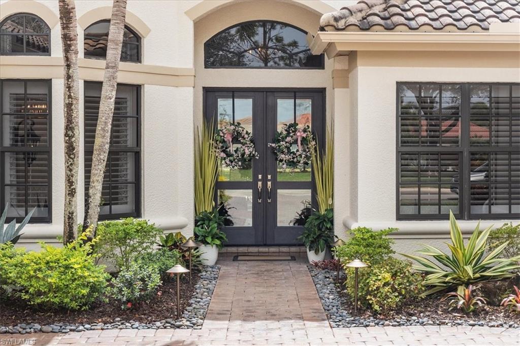 12130 Wicklow Lane Naples, FL 34120 - Photo 2 of 45 front view of front door
