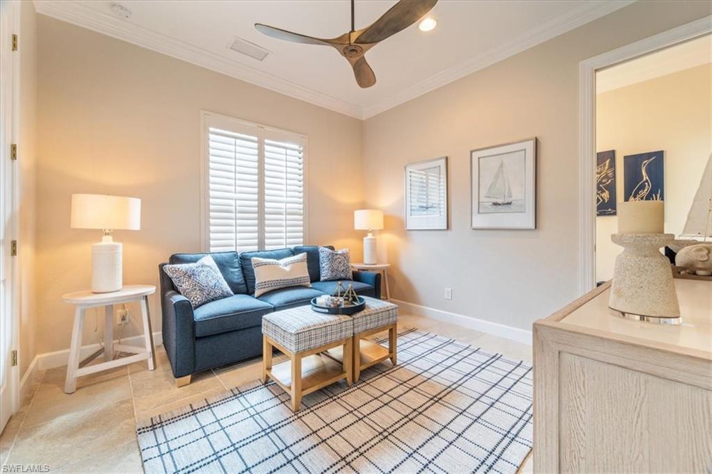 12130 Wicklow Lane Naples, FL 34120 - Photo 29 of 45 a living room with furniture and a window