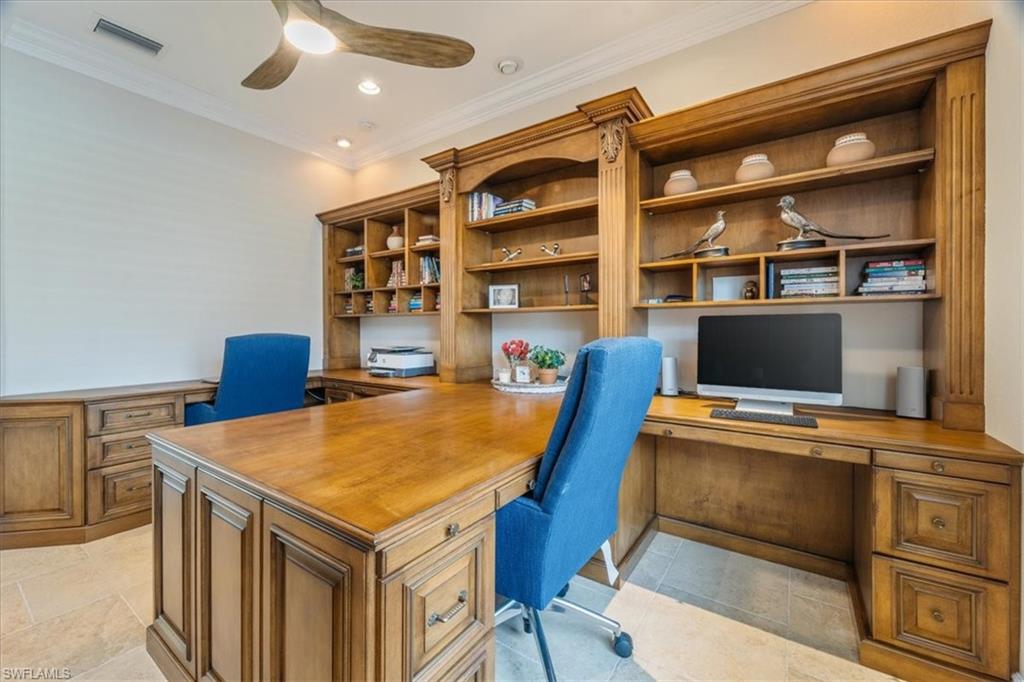12130 Wicklow Lane Naples, FL 34120 - Photo 31 of 45 a view of a workspace with furniture