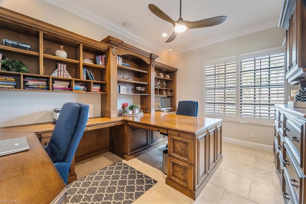12130 Wicklow Lane Naples, FL 34120 - Photo 32 of 45 a view of a workspace with furniture and a window