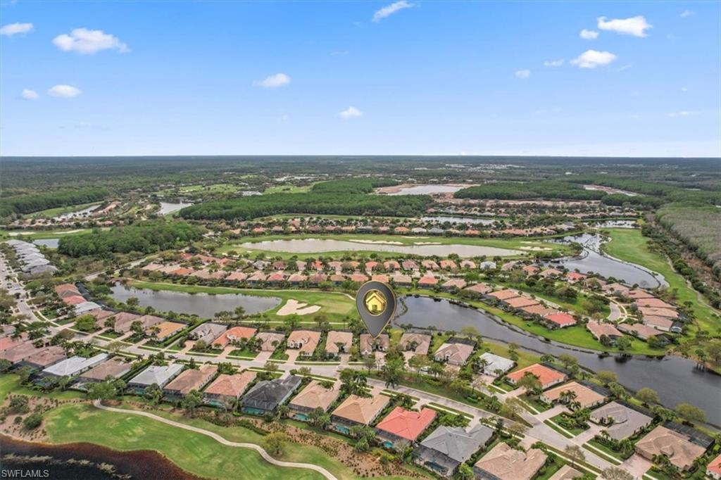 12130 Wicklow Lane Naples, FL 34120 - Photo 44 of 45 an aerial view of residential houses with outdoor space