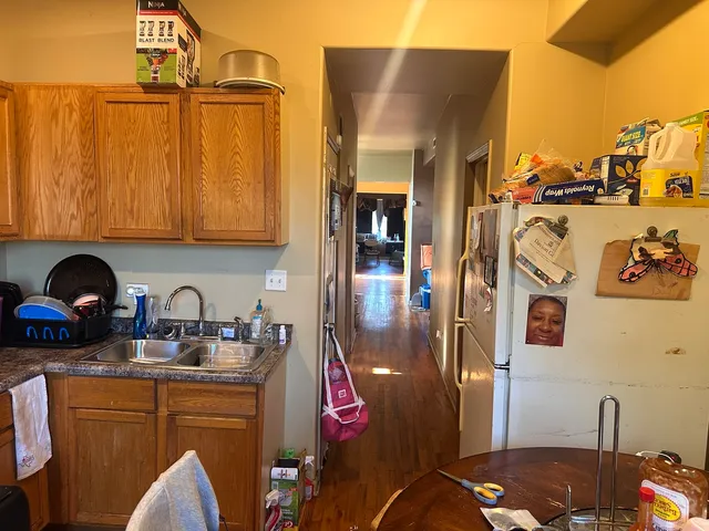 a kitchen with a sink and cabinets