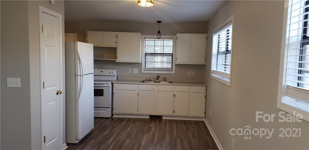 4380 Cannery Road Lancaster, SC 29720 - Photo 3 of 8 a kitchen with sink refrigerator and window