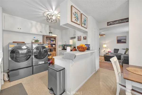 a bathroom with a sink a mirror and a shower