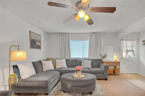 a living room with furniture and a couch