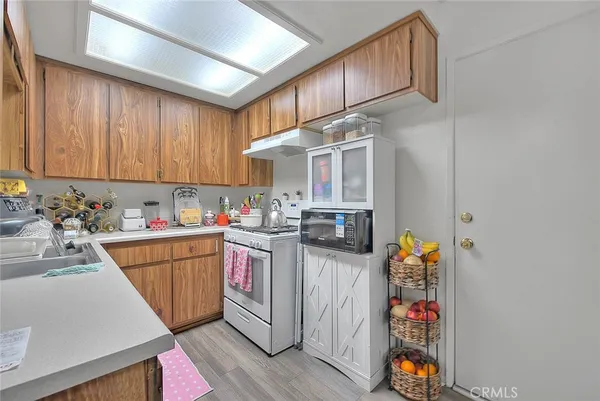 a bathroom with a sink vanity and a mirror