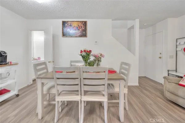 a view of living room with furniture and flat screen tv