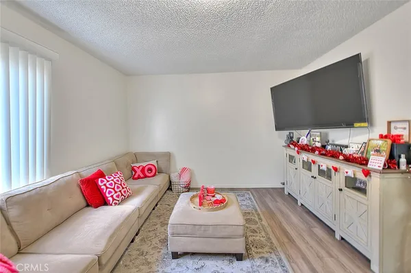 a bedroom with a bed and a closet