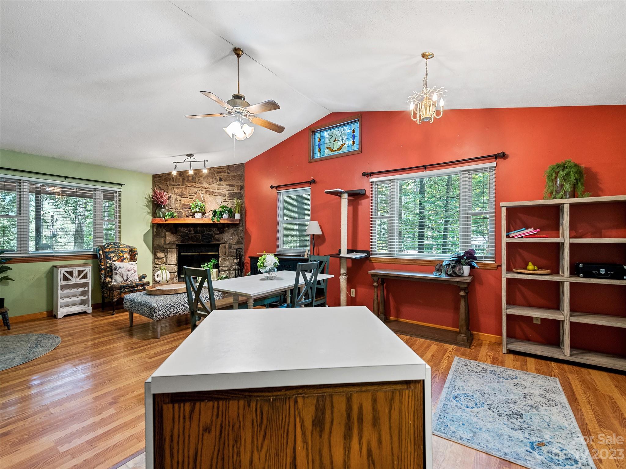 260 Reuben Branch Road Maggie Valley, NC 28751 - Photo 17 of 24 a living room with furniture a window and a flat screen tv