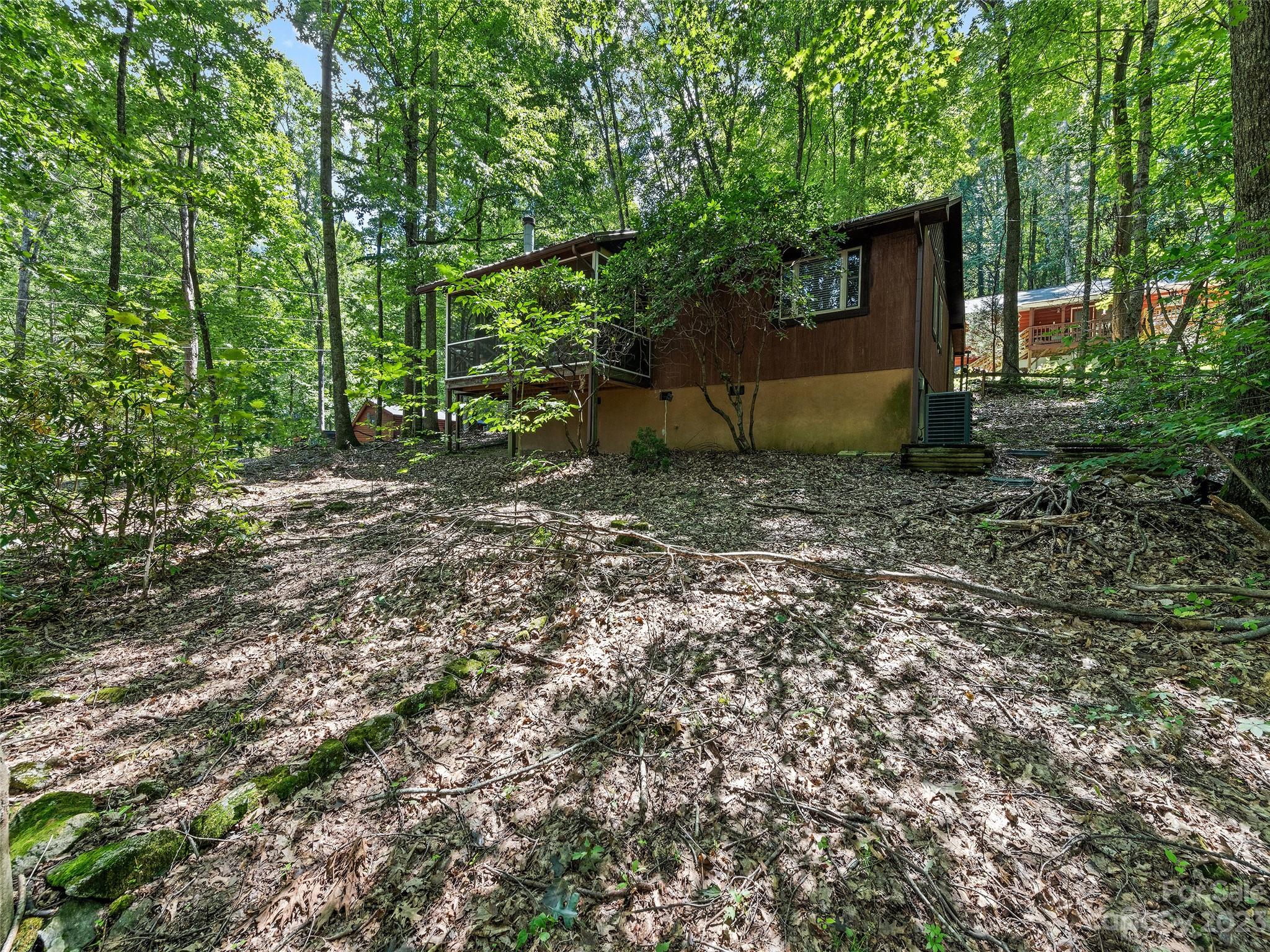 260 Reuben Branch Road Maggie Valley, NC 28751 - Photo 4 of 24 a view of a backyard