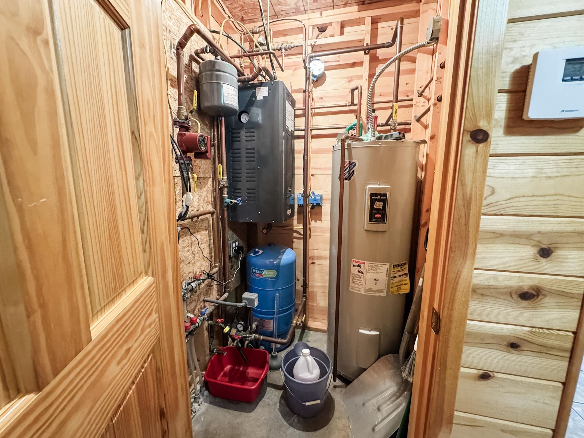 11466 Westerlund Loop Solon Springs, WI 54873 - Photo 40 of 55 Utilities featuring water heater