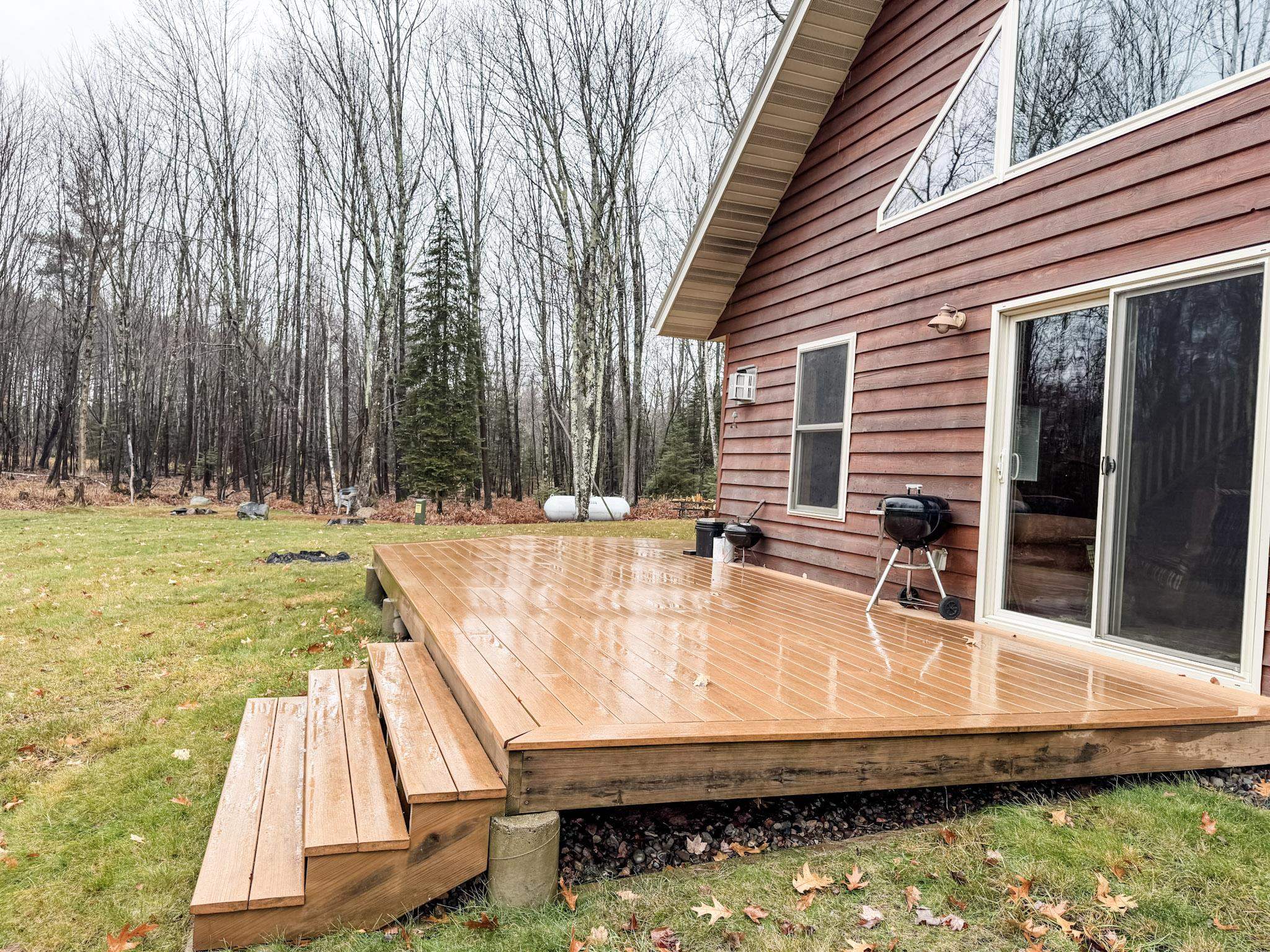 11466 Westerlund Loop Solon Springs, WI 54873 - Photo 7 of 55 Wooden terrace with a yard