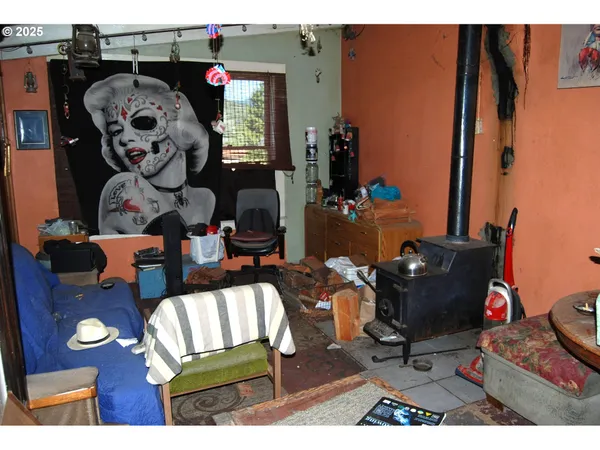 a kitchen with stainless steel appliances wooden cabinets a stove and a refrigerator