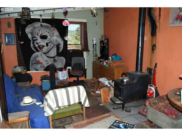 a kitchen with stainless steel appliances wooden cabinets a stove and a refrigerator