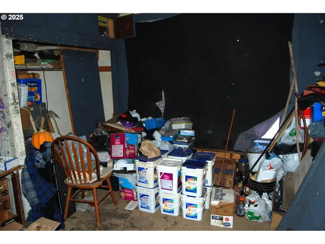 a view of living room with furniture and flat screen tv