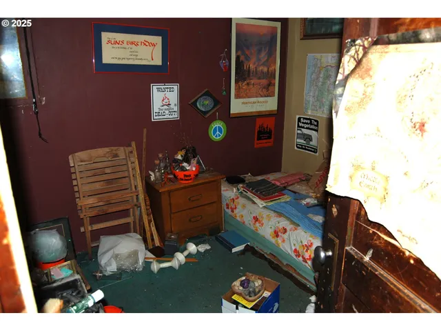 a living room with lots of furniture and a wooden floor
