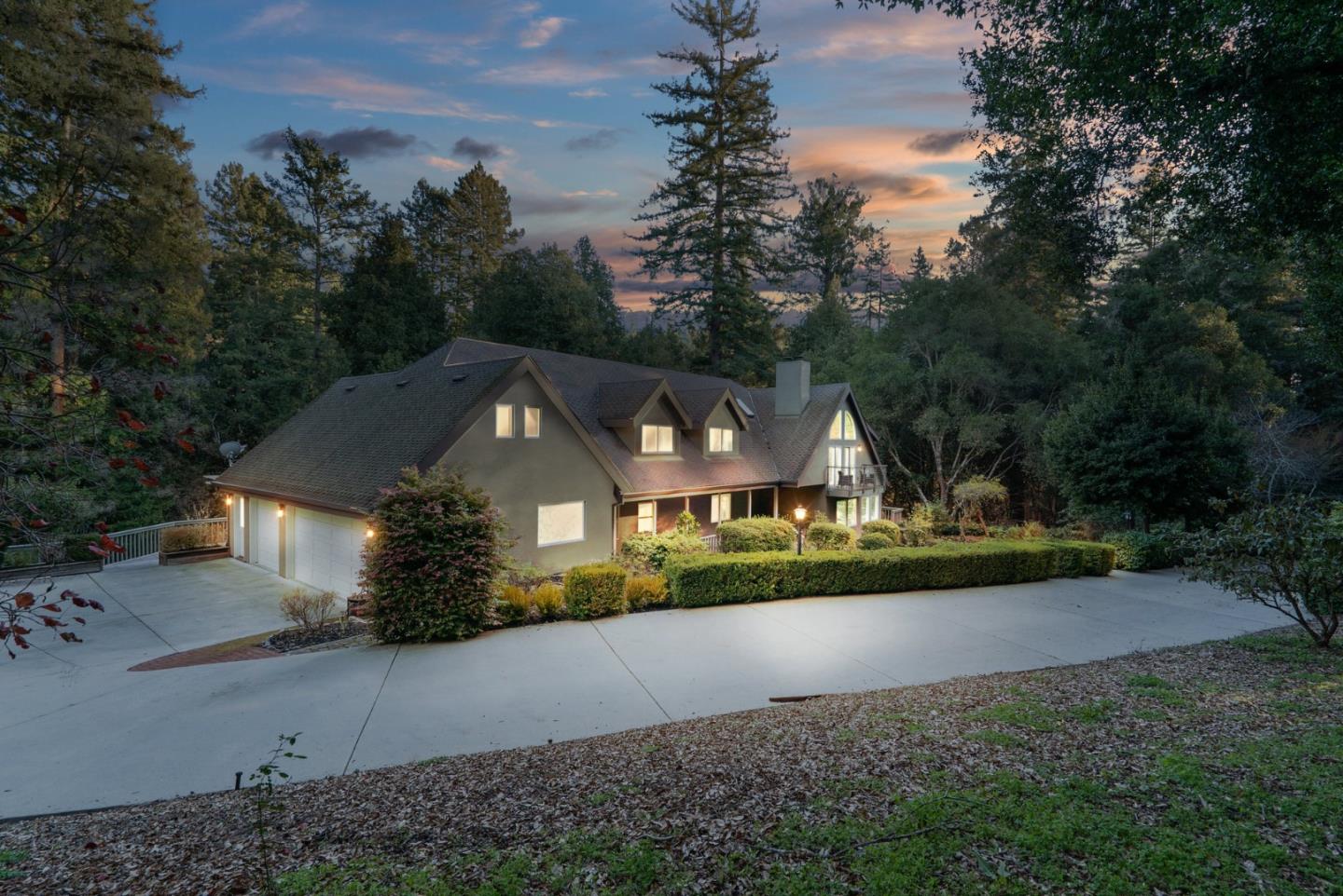 500 Bear Valley Road Aptos, CA 95003 - Photo 2 of 91 a front view of a house with a garden and yard