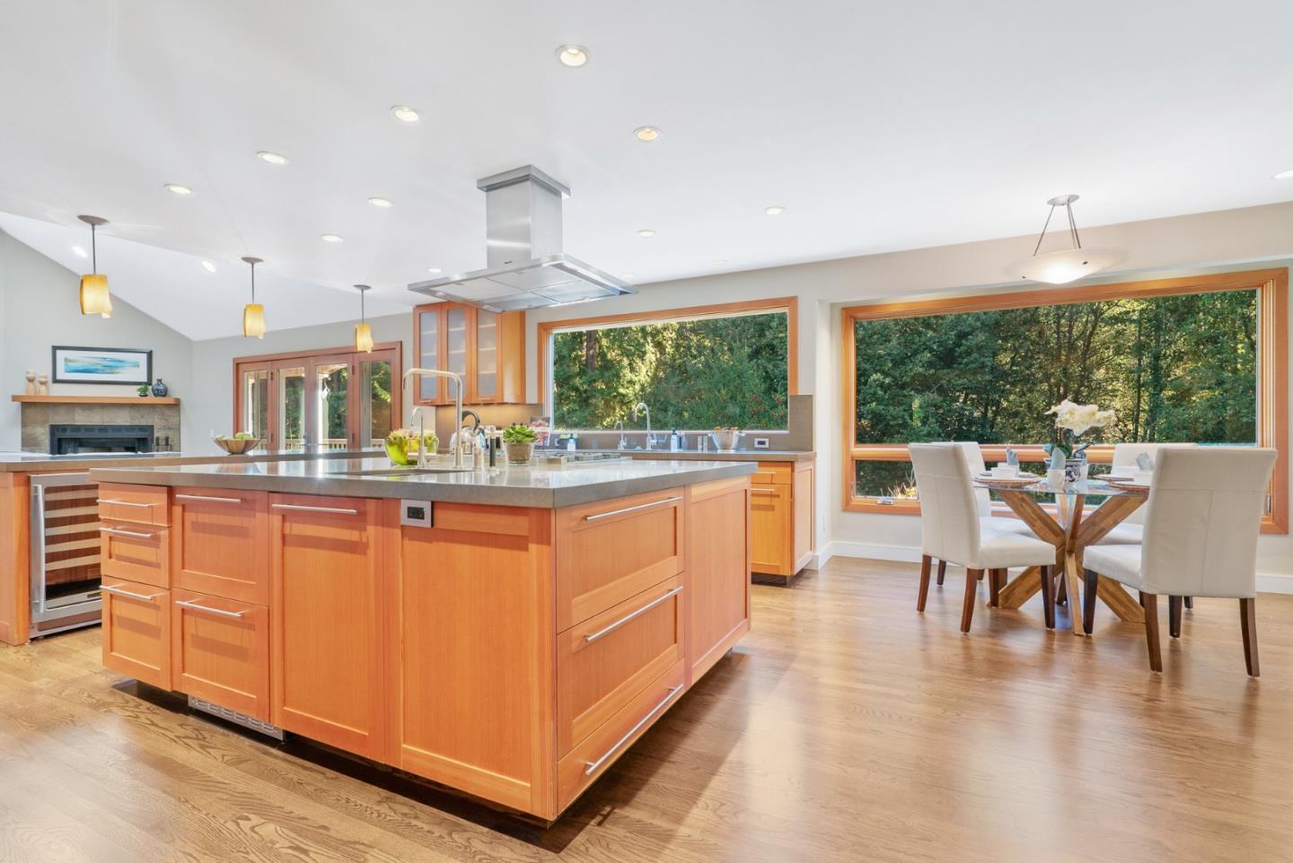 500 Bear Valley Road Aptos, CA 95003 - Photo 23 of 91 a kitchen with stainless steel appliances granite countertop a stove and a wooden floors